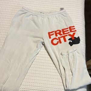 freecity women’s Joggers in Cream with Red Logo